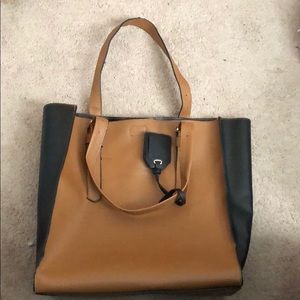 Large leather REED modern American luxury purse.